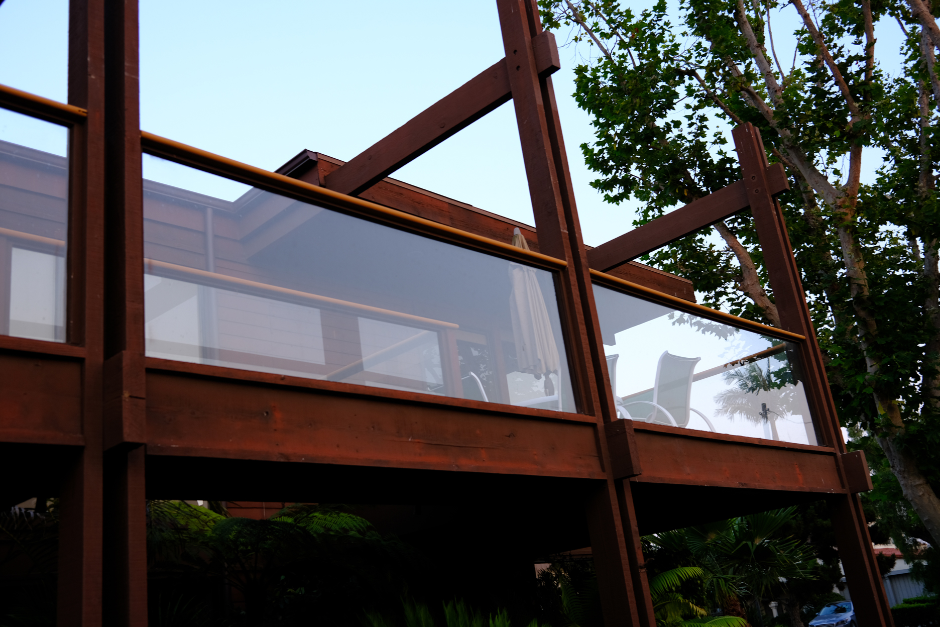 Clean balcony glass walls of a modern home.